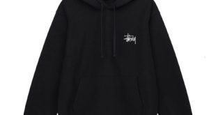 Close-up of a Stussy hoodie with the brand's signature logo, showcasing its classic streetwear design